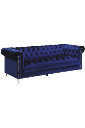 Sofá capitoné con brazos de esmoquin Bleker azul 