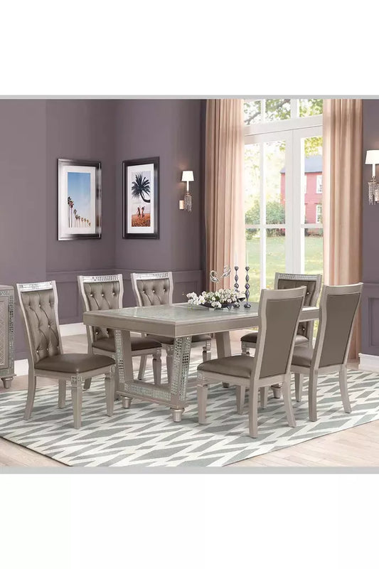 Mesa de comedor plateada con diseño de vidrio